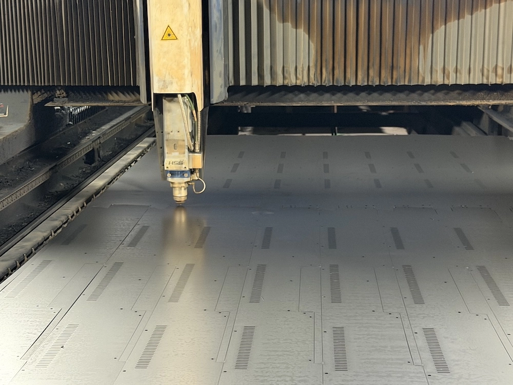 Sheet metal fabrication for slot machine cabinet parts